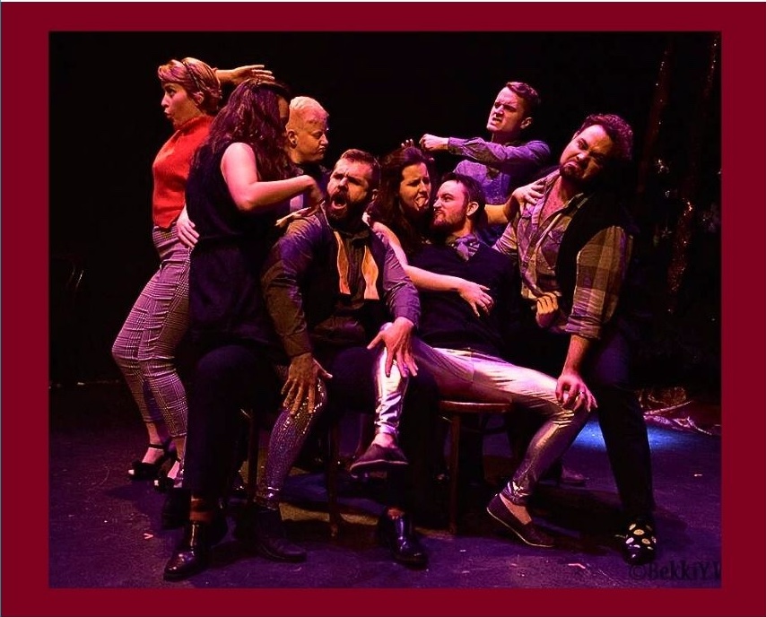 Full cast photo from 'Tis the Seasonal Depression featuring a comedic orgy.